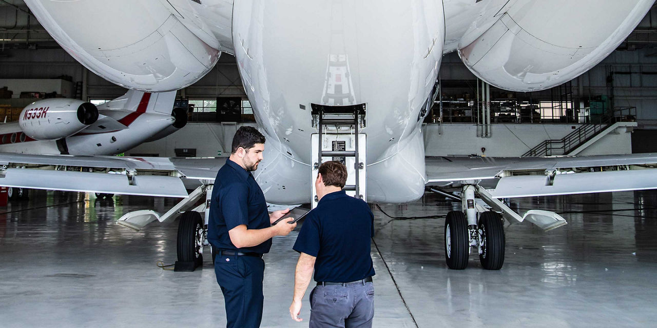Director of Maintenance Inspecting Rear of G650