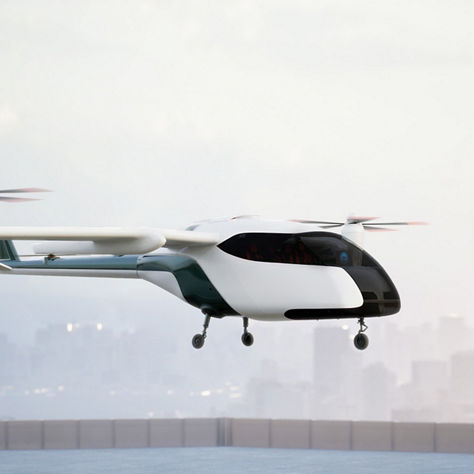 eVTOL vehicle hovering over a vertiport landing pad