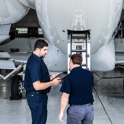 Director of Maintenance Inspecting Rear of G650