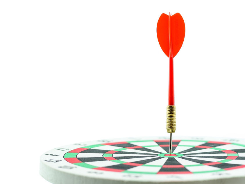 Dart hitting a bullseye 