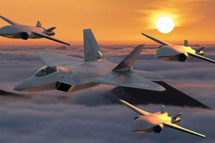Cutting-edge military aircraft and UAVs flying in formation above clouds during a stunning sunset.