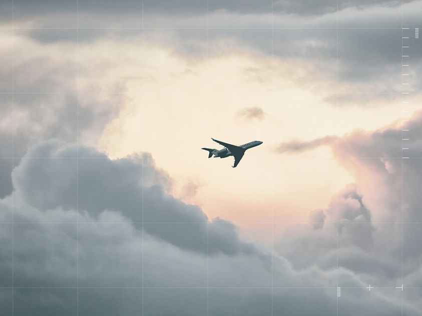 Aircraft navigating dramatic skies with Honeywell flight technology.