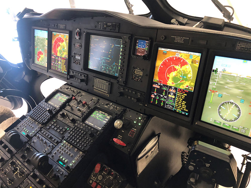 High-tech cockpit featuring integrated flight displays, navigation systems, and control panels for efficient aircraft operation