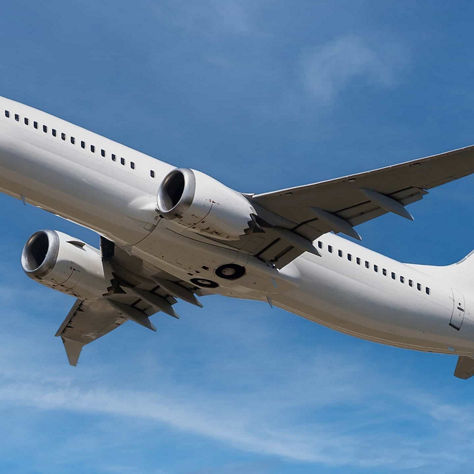 a Boeing passenger airplane flying high in the sky