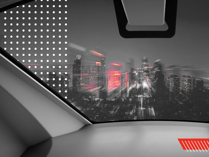 an image of a futuristic cityscape featuring sleek buildings as seen from inside a cockpit