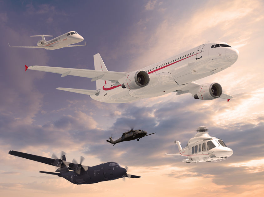 Featuring a coordinated mix of commercial, military, and rotary aircraft highlighting advanced aerospace platforms operating together across diverse mission environments.
