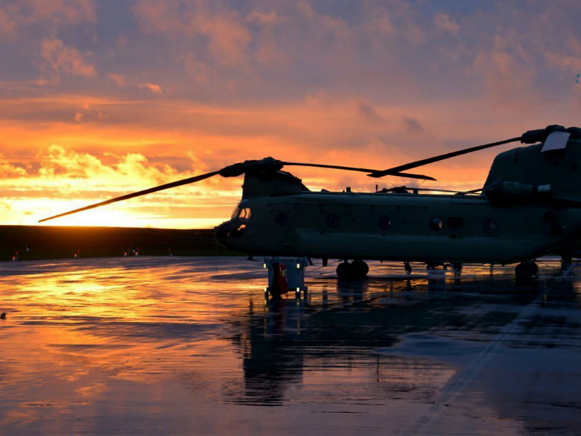Chinook helicopters from the 2-227th Aviation Regiment, 1st Air Cavalry Brigade out of Fort Hood Texas sit on the flight line at Katterbach Army Airfield in Ansbach, Bavaria, Germany, during sunset Nov. 21, 2017. The 2-227th Aviation Regiment, 1st Air Cavalry Brigade is on a nine-month rotation in support of Atlantic Resolve. Atlantic Resolve is a demonstration of continued U.S. commitment to collective security through a series of actions designed to reassure NATO allies and partners of America's dedication to enduring peace and stability in the region. (U.S. Army photo by Charles Rosemond)