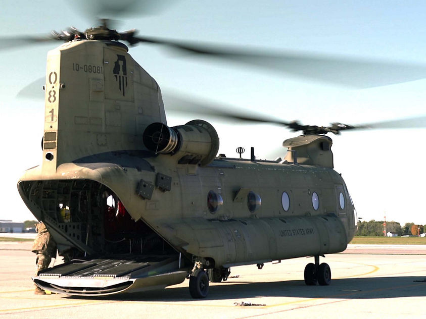 Chinook helicopter with its rear cargo ramp open.