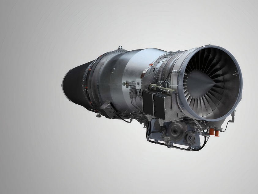 A modern turbofan aircraft engine displayed against a neutral gradient background. The image shows detailed compressor blades and external components, highlighting advanced aerospace engineering and propulsion technology.
