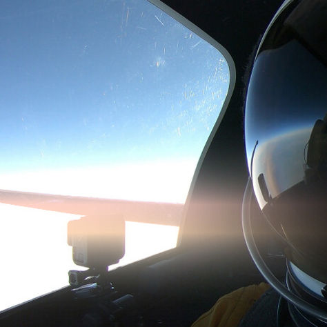 image of pilot helmet in jet