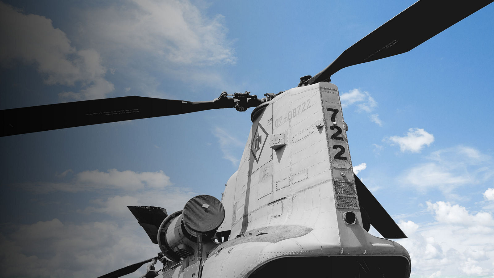 A Boeing Vertol CH-46 Sea Knight helicopter with a prominent top-mounted propeller, showcasing its military design.