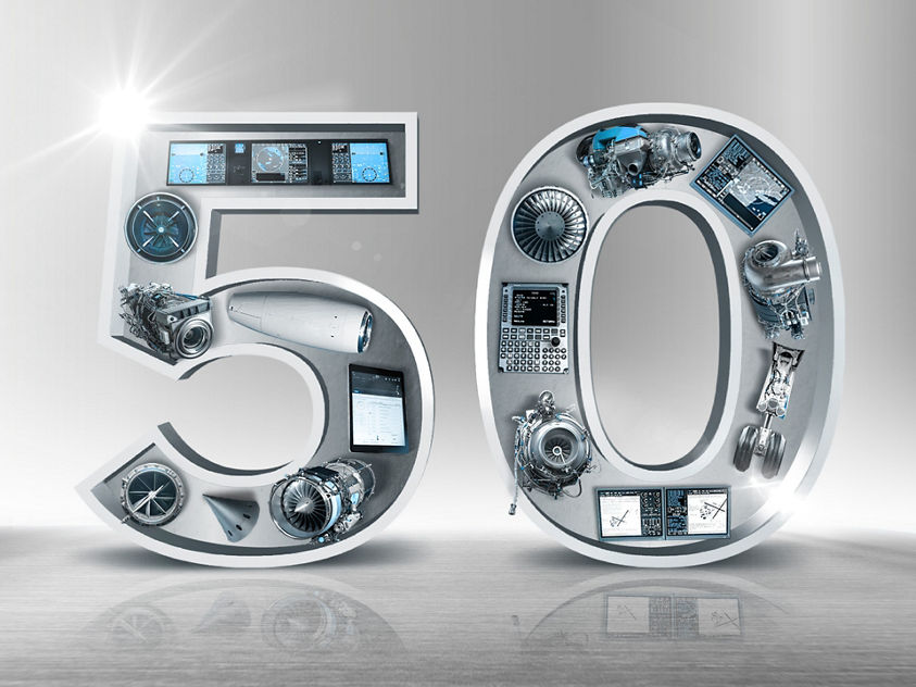 The image displays the number 50, which is composed of various components related to engineering and technology, marking the anniversary of MSP from Honeywell Aerospace