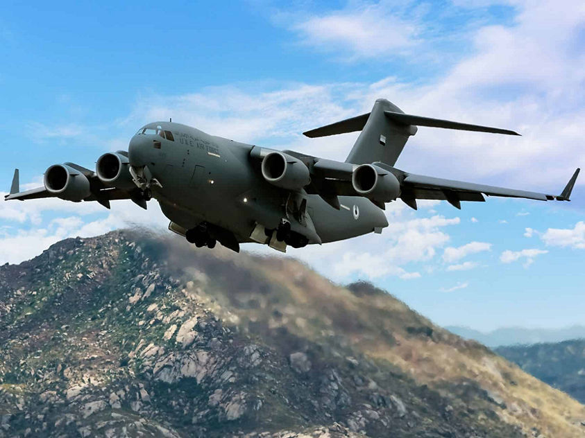 an image of boeing c-17 globemaster III flying