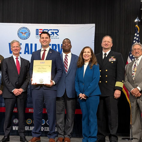 Honeywell team members receive ESGR recognition for supporting Guard and Reserve personnel in a formal award ceremony.