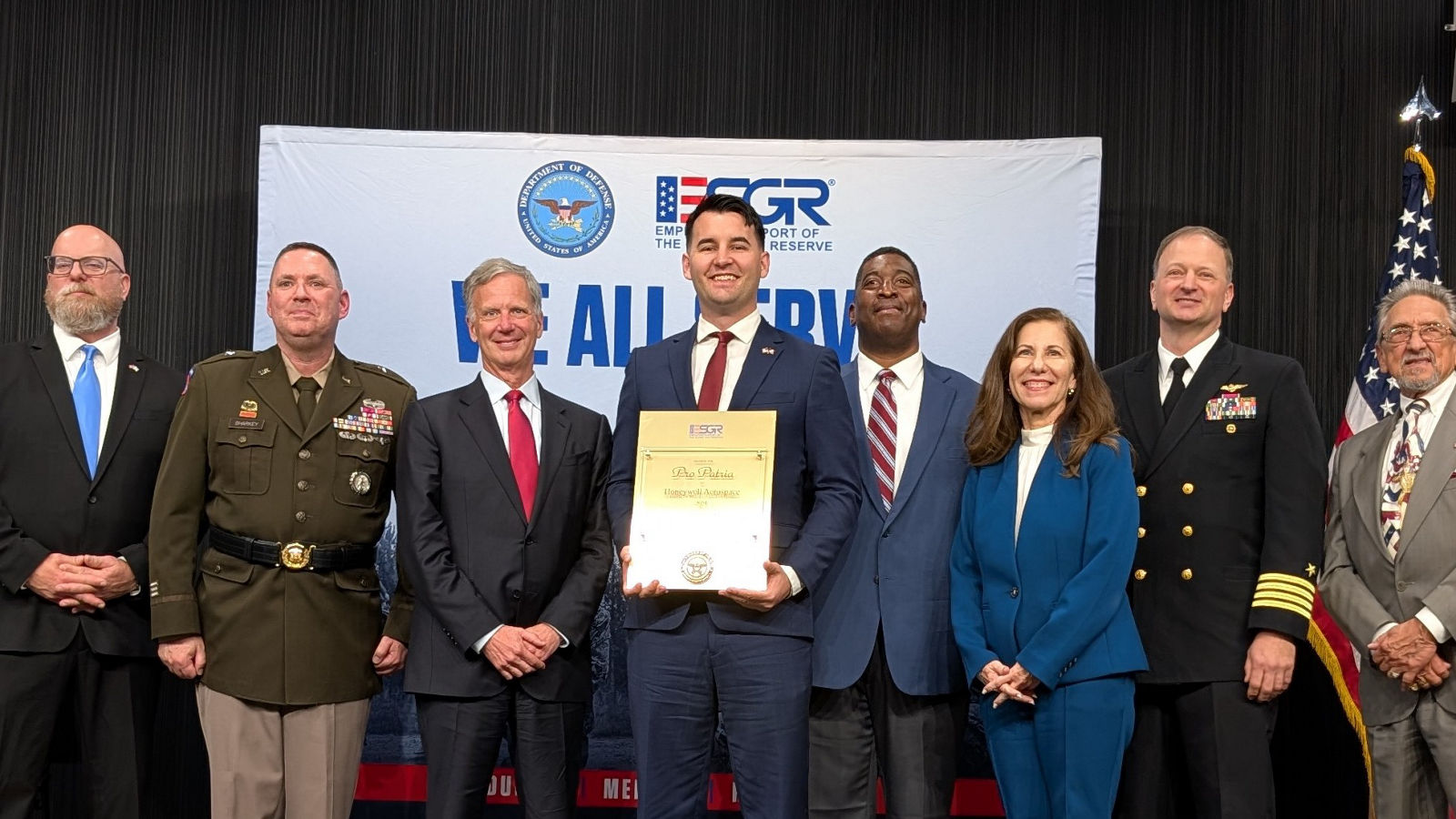 Honeywell team members receive ESGR recognition for supporting Guard and Reserve personnel in a formal award ceremony.