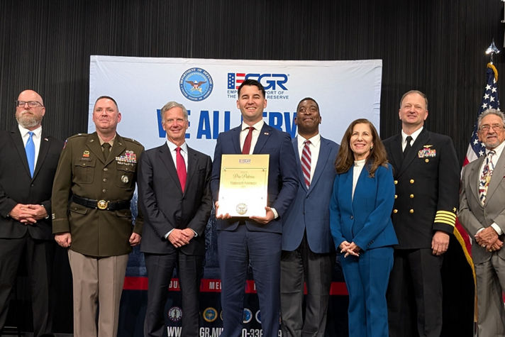 Honeywell team members receive ESGR recognition for supporting Guard and Reserve personnel in a formal award ceremony.